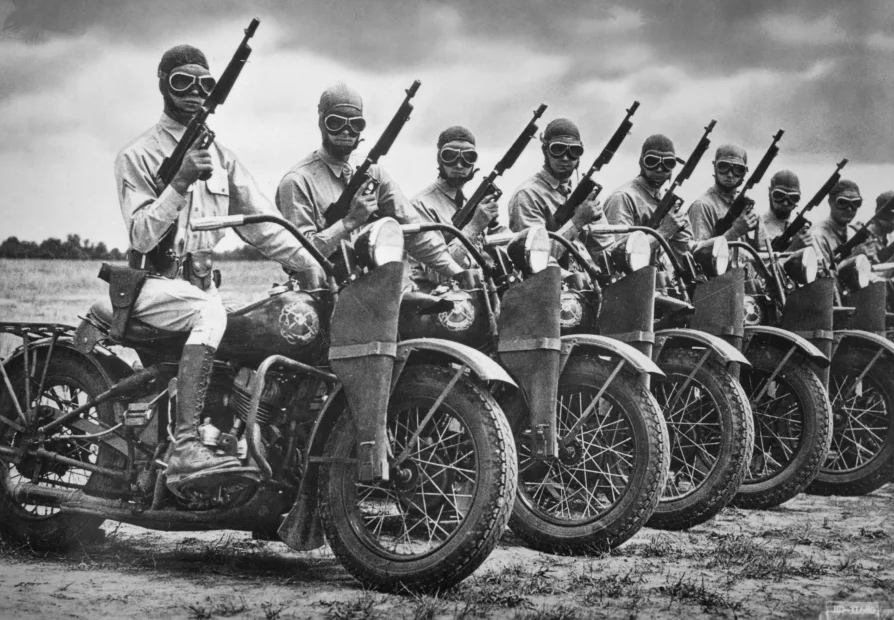 US Troops during WW2 poised for action atop Harley-Davidson WLAs